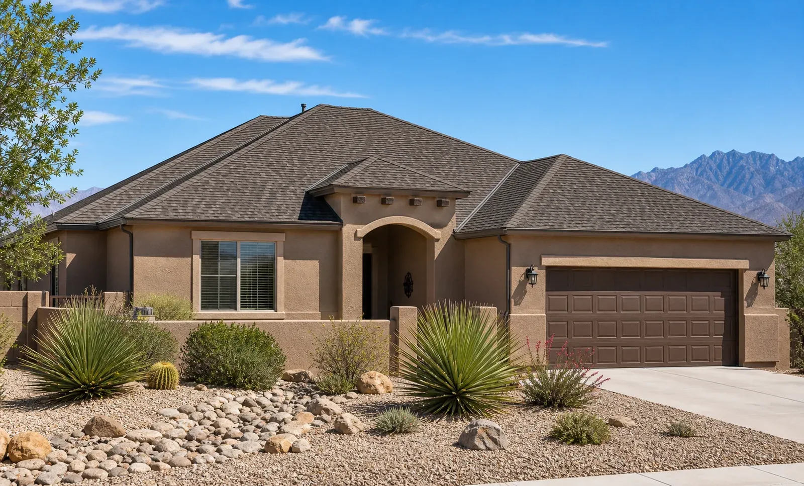 New architectural shingle roof on a Las Cruces stucco home